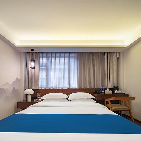 張家界武陵源北岸輕奢客棧 森林公園店 Hotell Zhangjiajie Eksteriør bilde