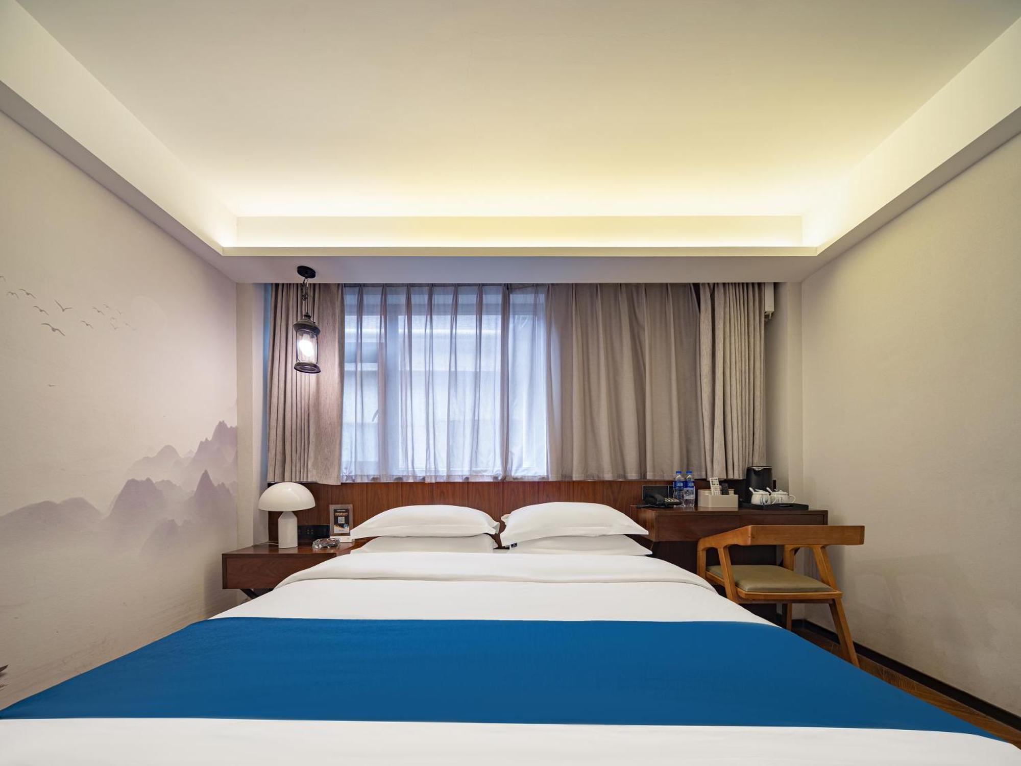 張家界武陵源北岸輕奢客棧 森林公園店 Hotell Zhangjiajie Eksteriør bilde