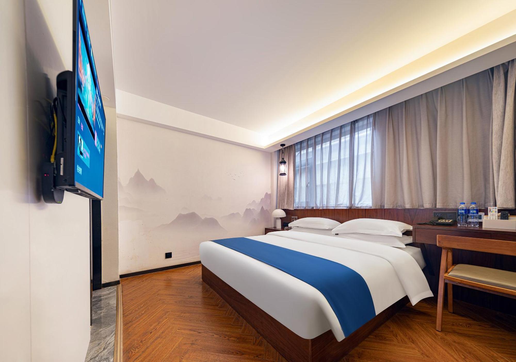 張家界武陵源北岸輕奢客棧 森林公園店 Hotell Zhangjiajie Eksteriør bilde