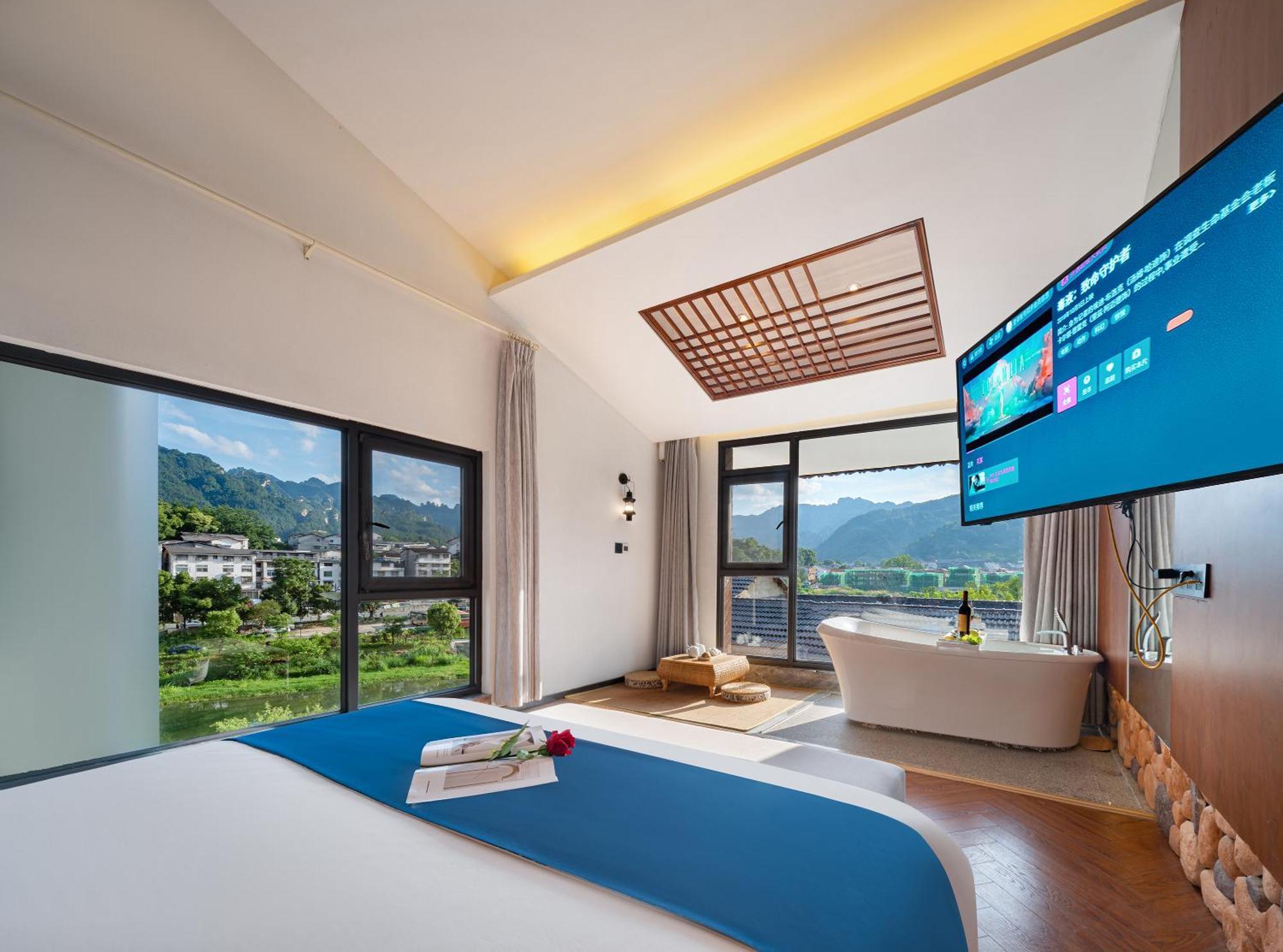 張家界武陵源北岸輕奢客棧 森林公園店 Hotell Zhangjiajie Eksteriør bilde