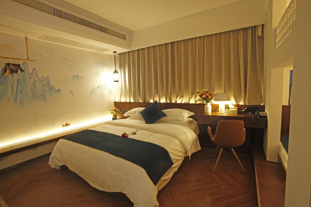 張家界武陵源北岸輕奢客棧 森林公園店 Hotell Zhangjiajie Eksteriør bilde