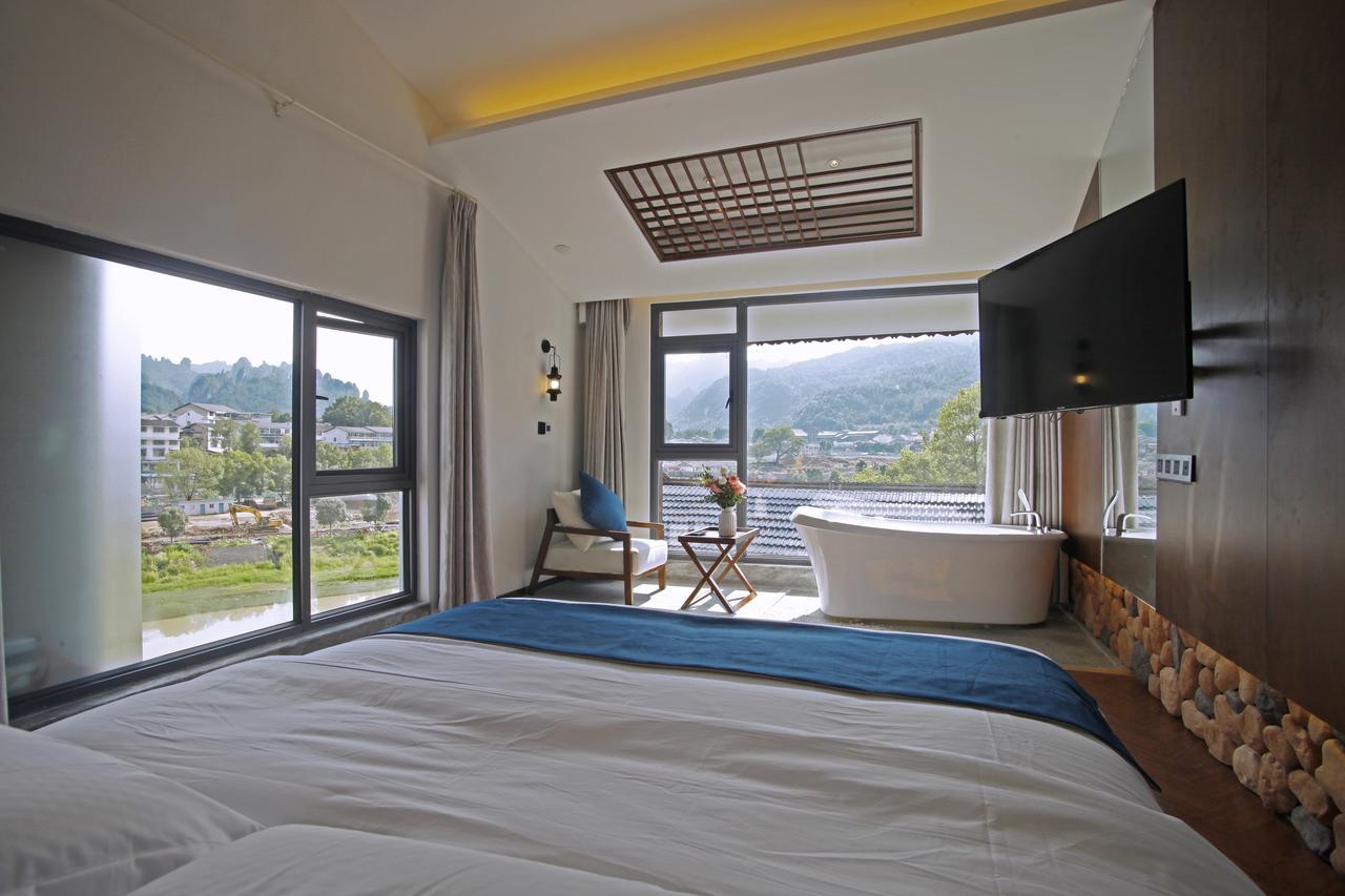 張家界武陵源北岸輕奢客棧 森林公園店 Hotell Zhangjiajie Eksteriør bilde